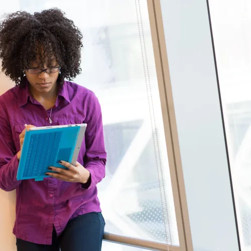 woman taking notes